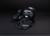 Pair of black dumbbells with 'Younix' branding on a dark background